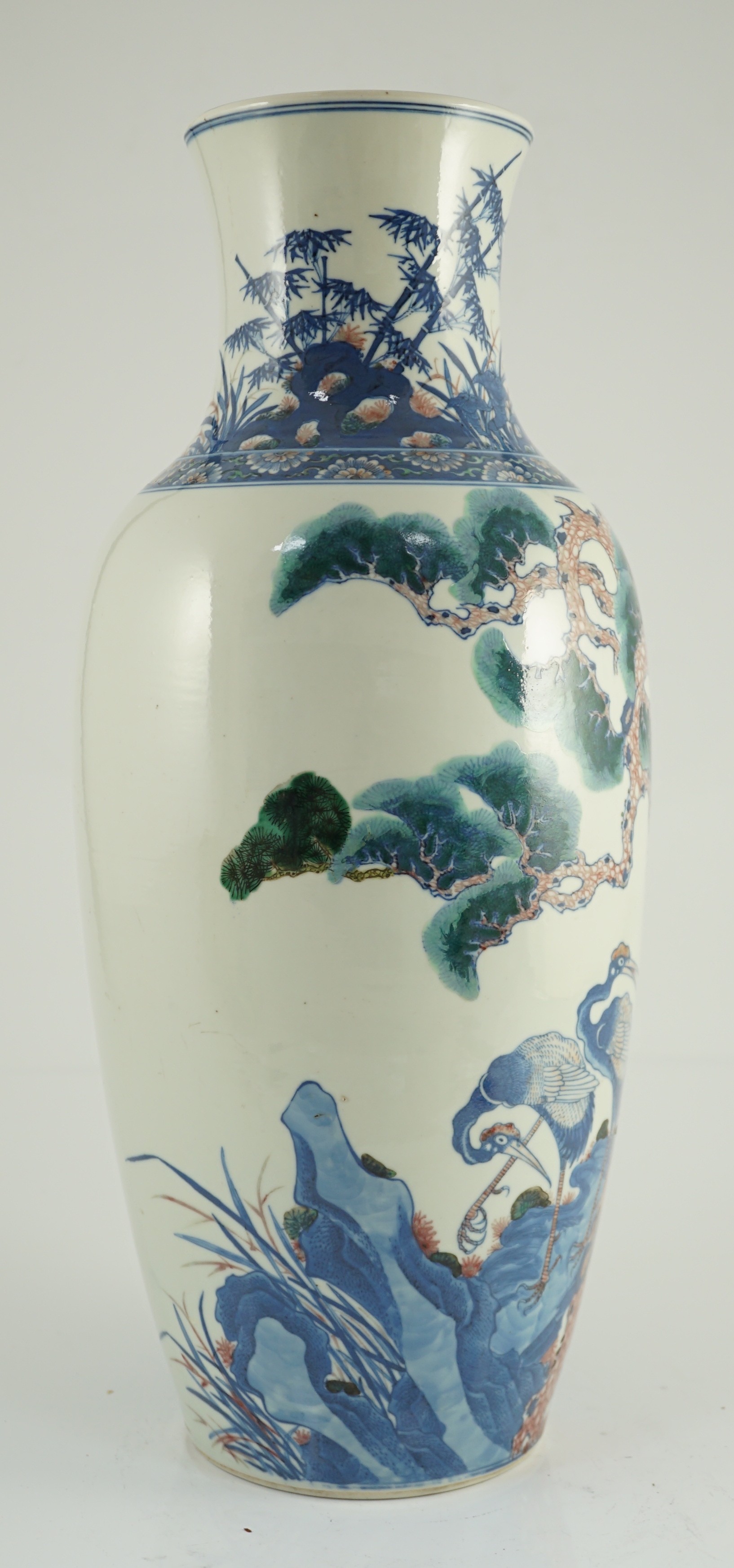 An unusual Chinese green enamelled underglaze blue and copper red tall vase, 19th century, 46.4cm high